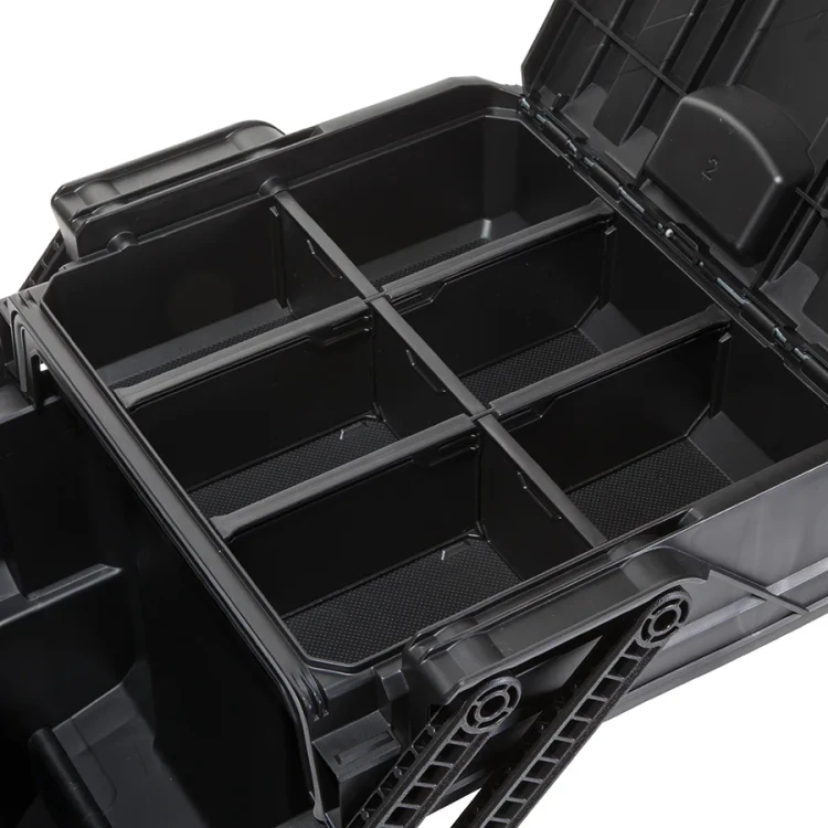 Wnętrze skrzynki z sześcioma pustymi przegrodami; widok z góry na podzieloną przestrzeń organizacyjną.